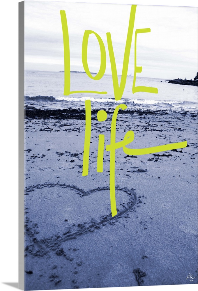 "Love Life" handwritten over a photograph of a heart drawn in the sand on a beach.