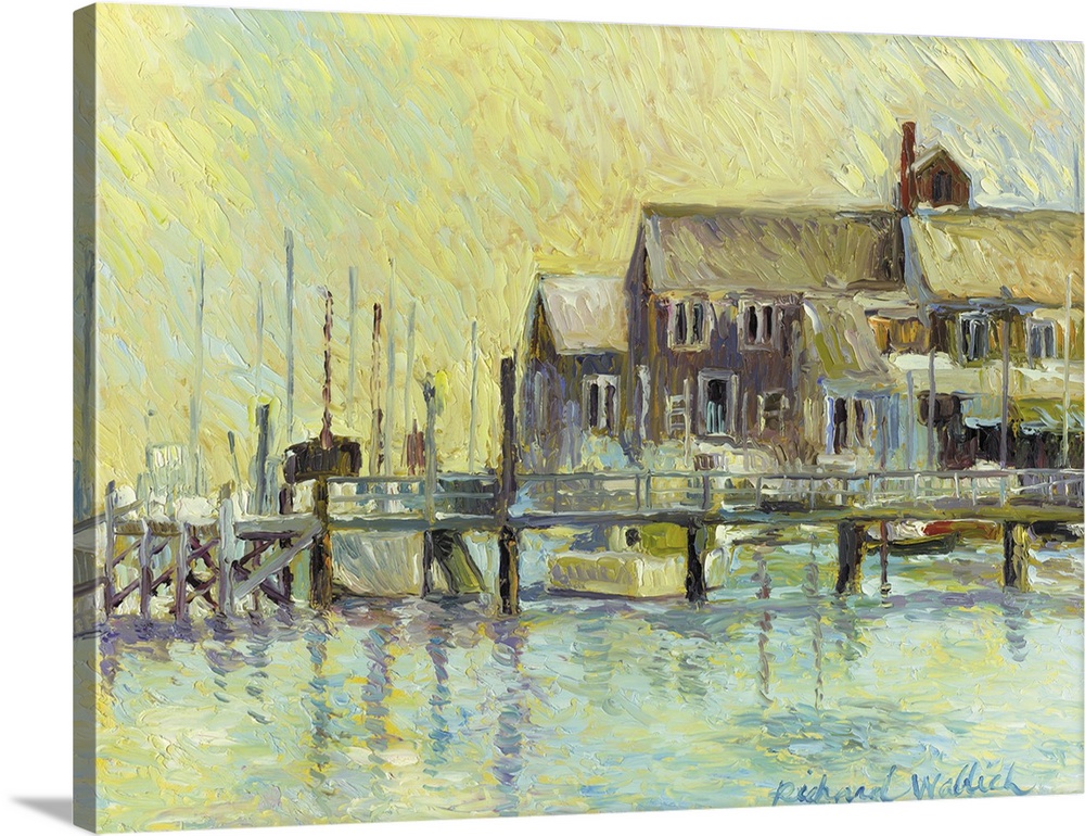 Water scene with a dock and a large building in the background.