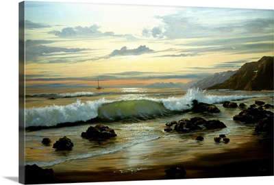 Ocean Waves On Rocky Beach At Sunset