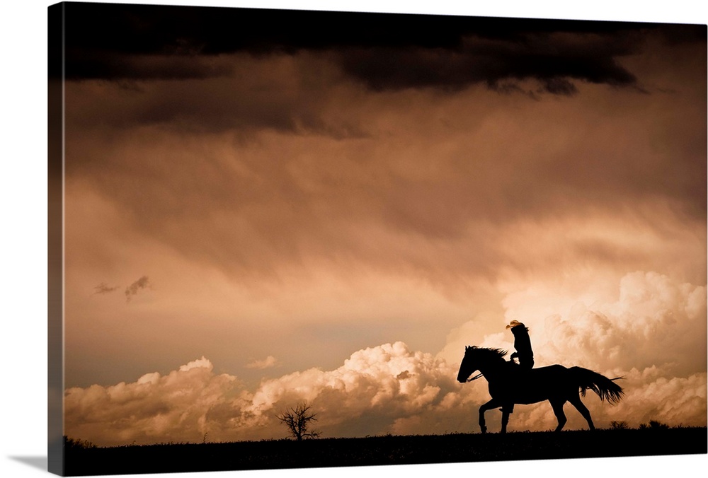 Stormy clouds and lone rider