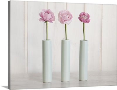 Row Of 3 Pink Flowers In Blue Vases