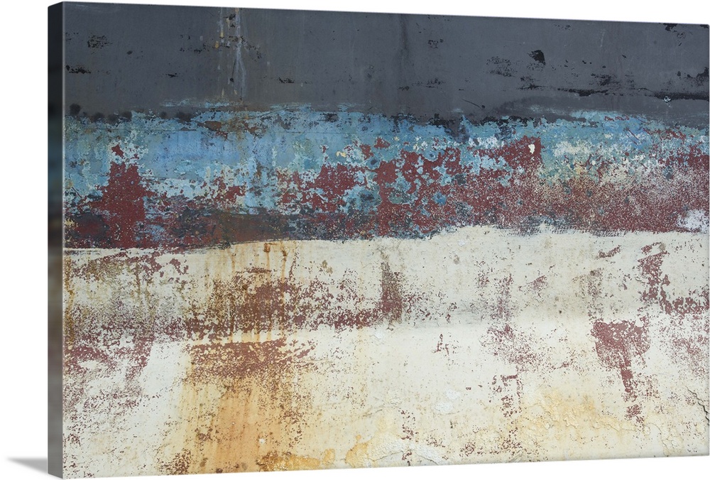 An artistic photograph of a close abstract view of a ships hull looking weathered and rusty.
