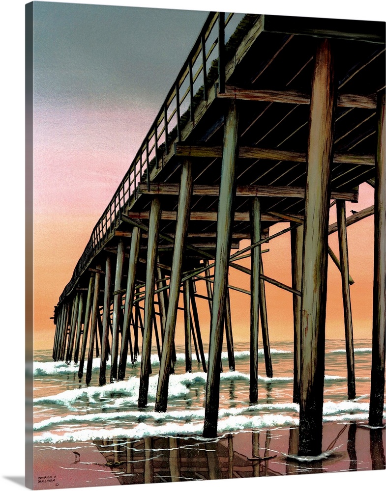 Photograph of a tall pier jetting out over the ocean from the beach.