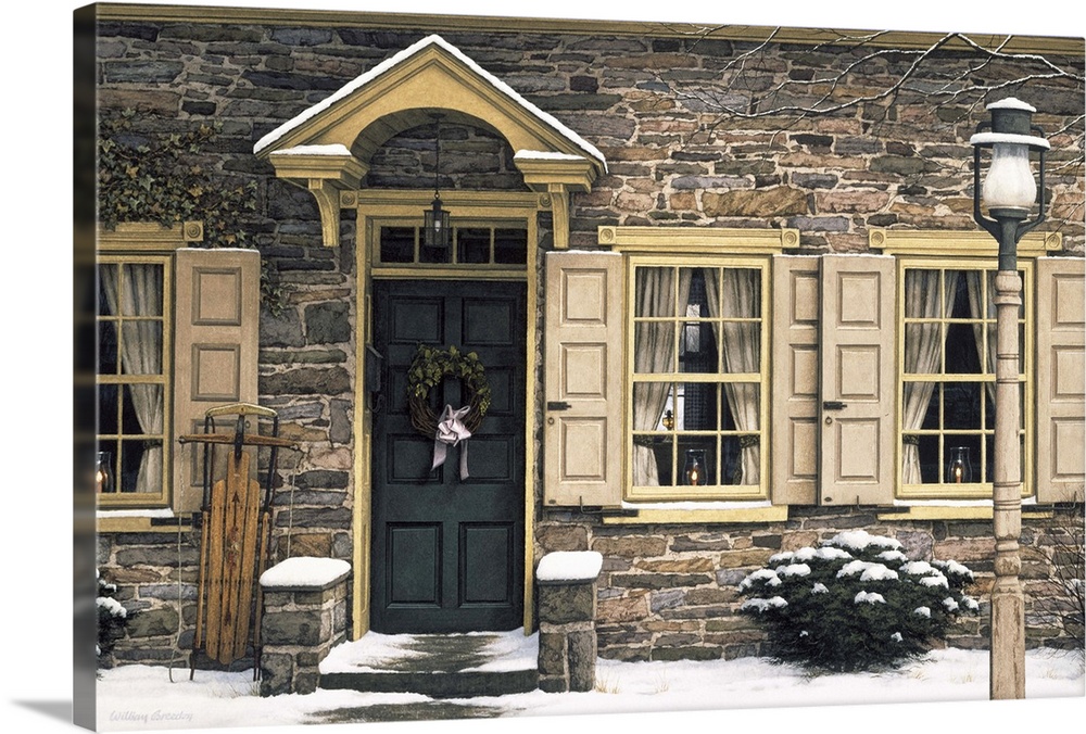 The front of a stone house with candles in the windows and a doorway with a wreath hanging on it.