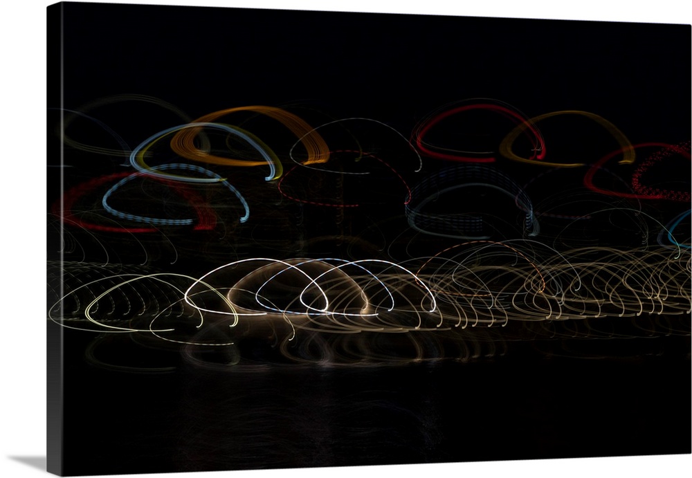 Abstract photograph of a light painting scene in circular motion.