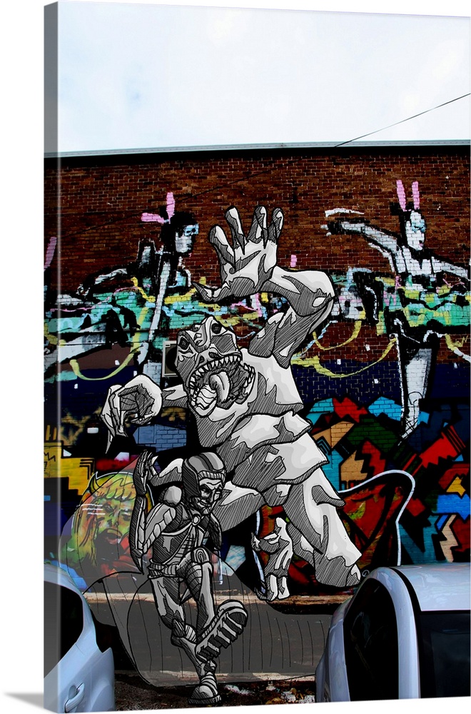 Graffiti photograph with illustration of a superhero running away from a monster.
