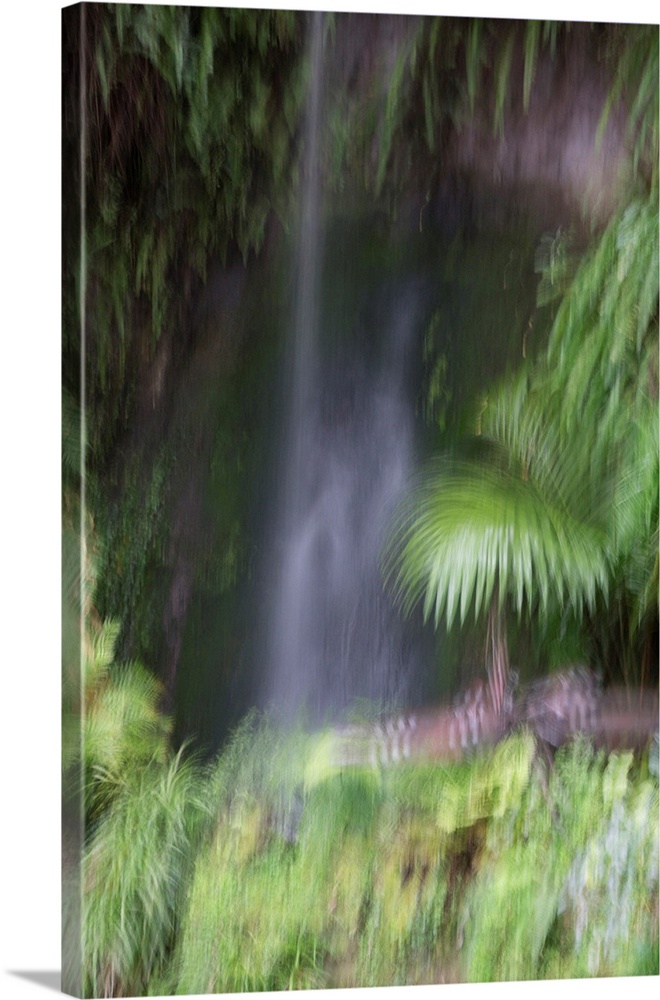 Impressionist photograph of a waterfall in the Eden garden.