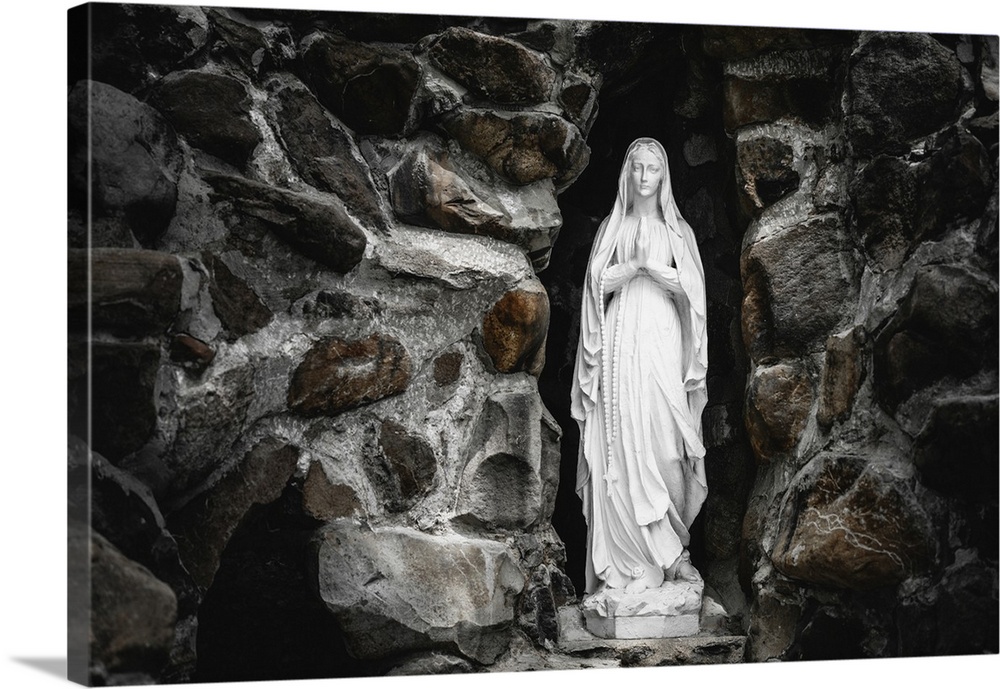 Virgin Mary Statue In The Rocks