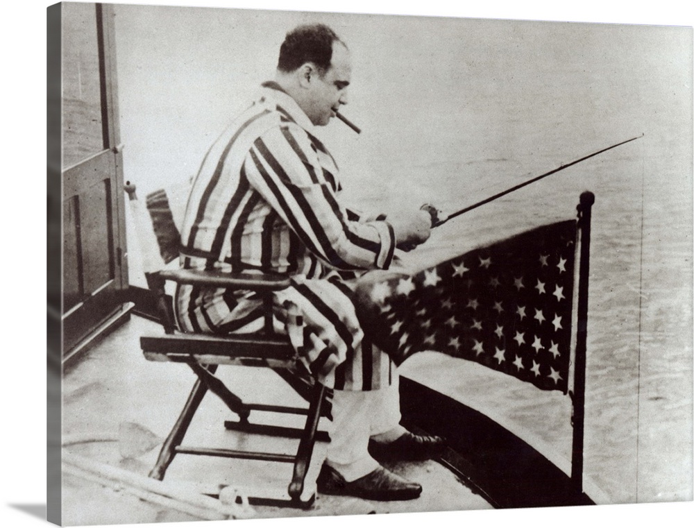 Al Capone (1899-1947) fishing on his yacht