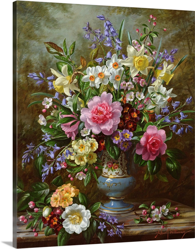 Bluebells, daffodils, primroses and peonies in a blue vase