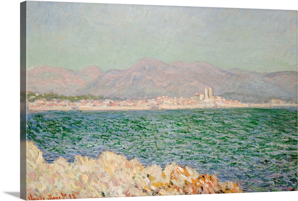 A piece of classic artwork with water in the foreground and buildings lining the beach behind it. Mountains are painted in...