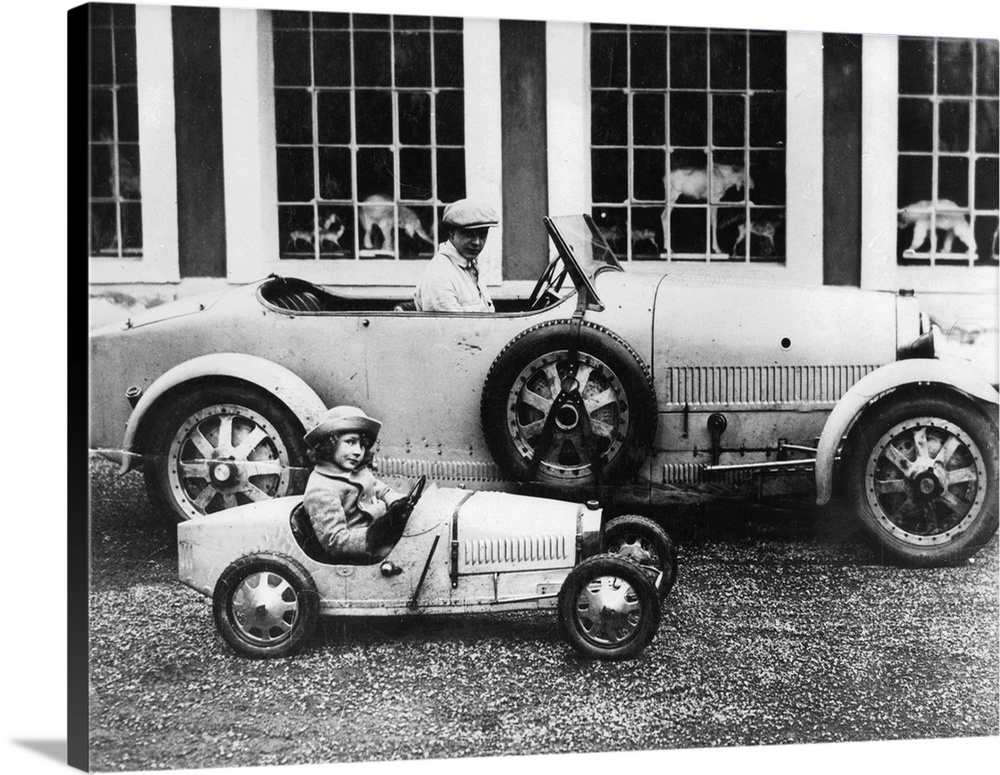 Jean Bugatti (1909) and Roland Bugatti (1922) sons of Ettore Bugatti in cars made by their father, c. 1928