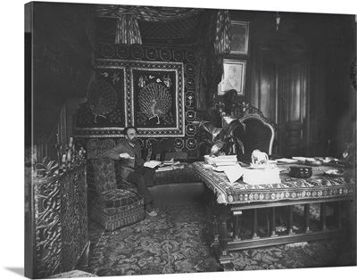 Portrait Of Emile Zola (1840-1902) Seated On His Sofa