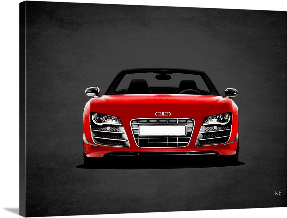 Photograph of a red Audi R8 printed on a black background with a dark vignette.