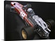 image thumbnail of Illustration of a Formula One car on a black background, highlighting the back engine.