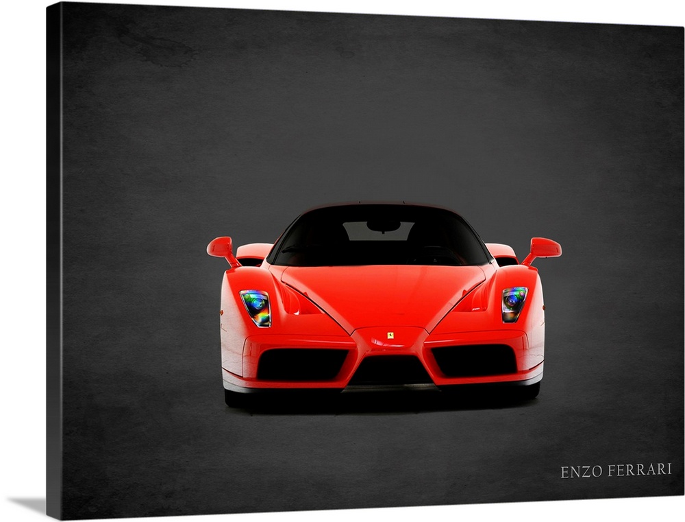 Photograph of a red Ferrari Enzo printed on a black background with a dark vignette.