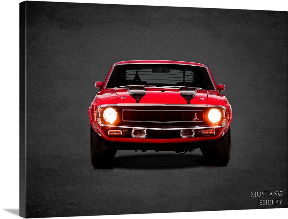 Photograph of a red 1970 Ford Mustang Shelby with black stripes printed on a black background with a dark vignette.
