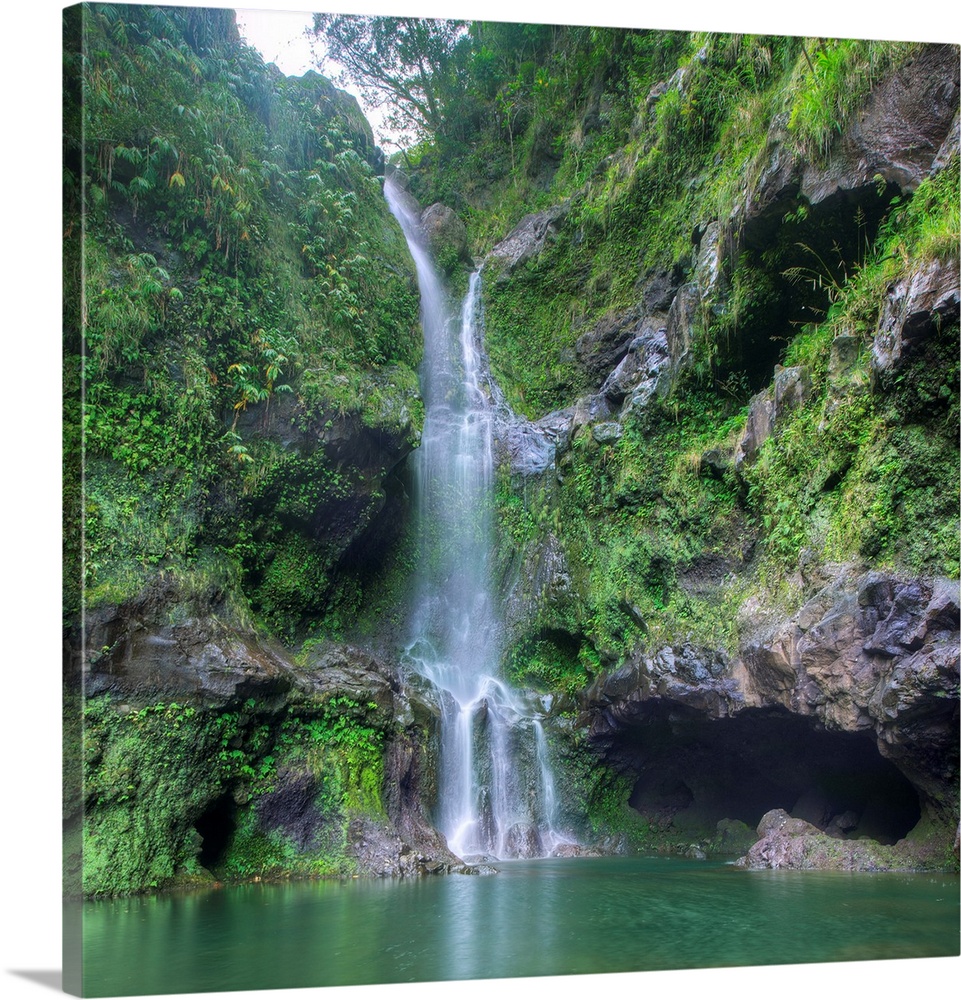 Square photograph of a lush waterfall in Hana, Hawaii.