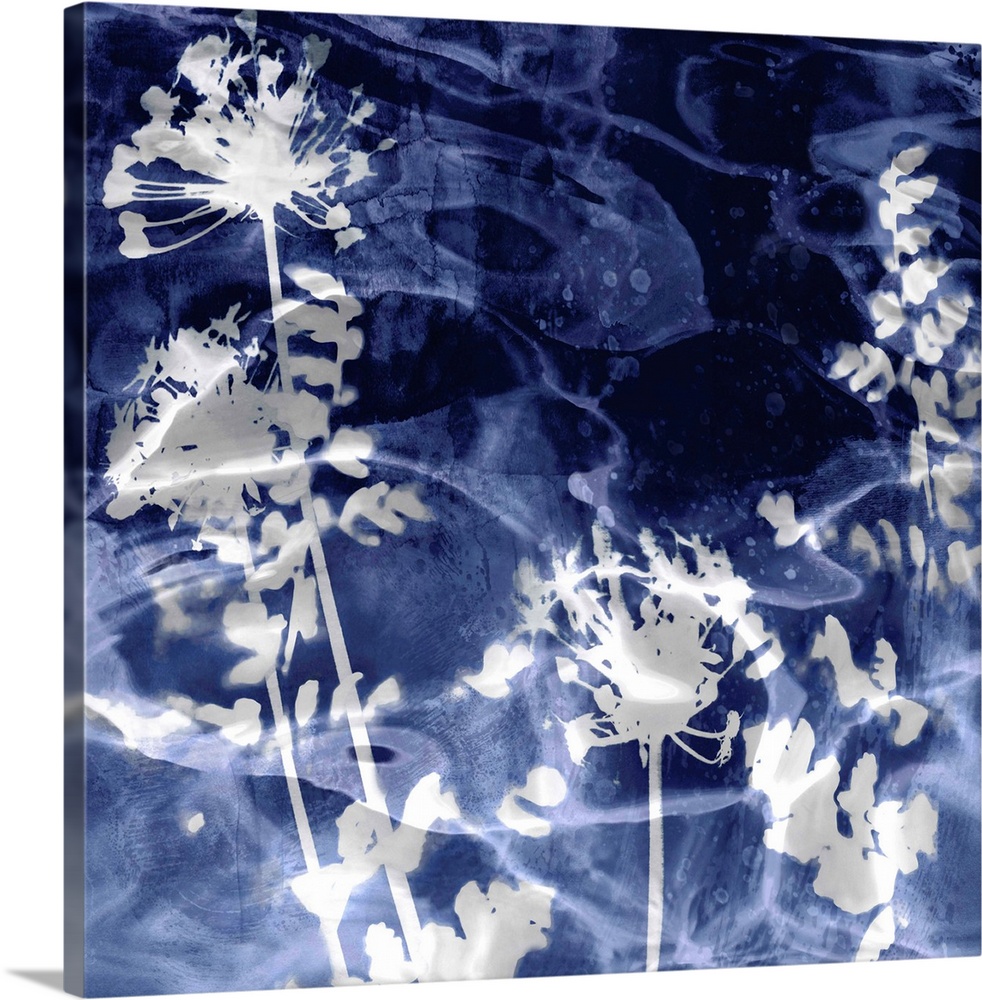 Square home decor with silver silhouettes of leaves and flowers on an indigo background with a watery look.