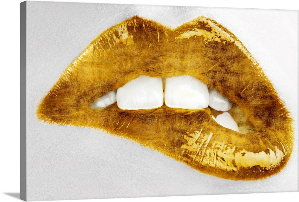 Close up of a woman biting her lip with bright gold lipstick