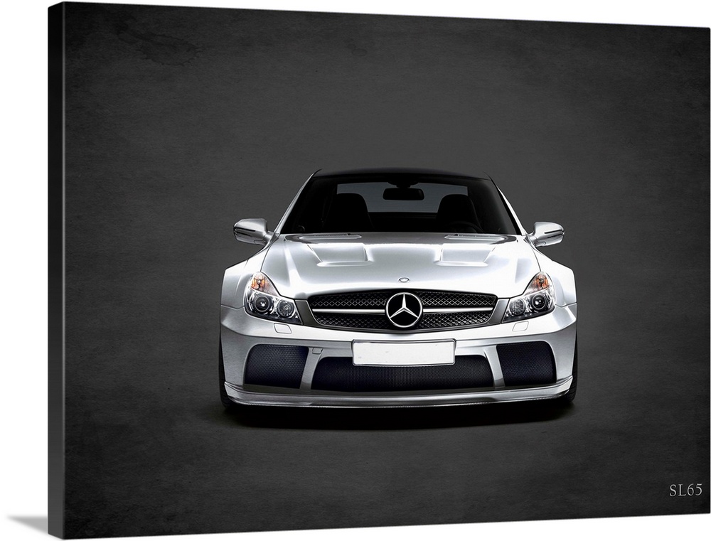 Photograph of a silver Mercedes Benz SL65 printed on a black background with a dark vignette.
