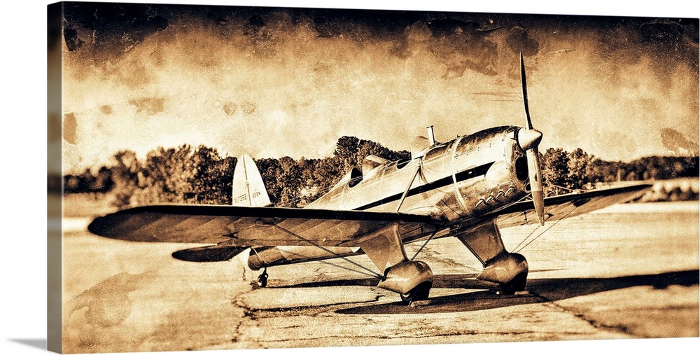 A distressed photograph of an antique airplane.