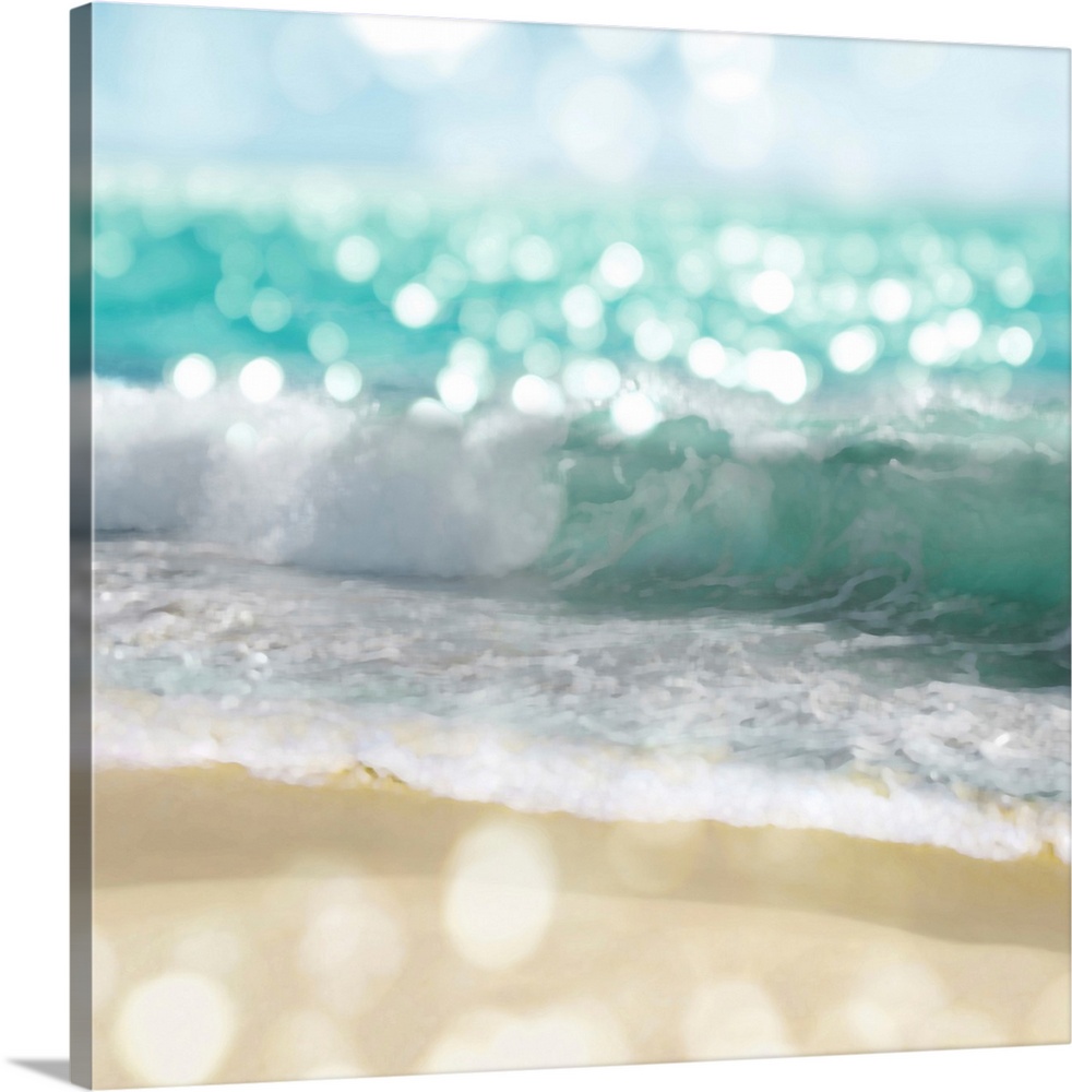 Square photograph of beach waves and the shore with a bokeh effect.