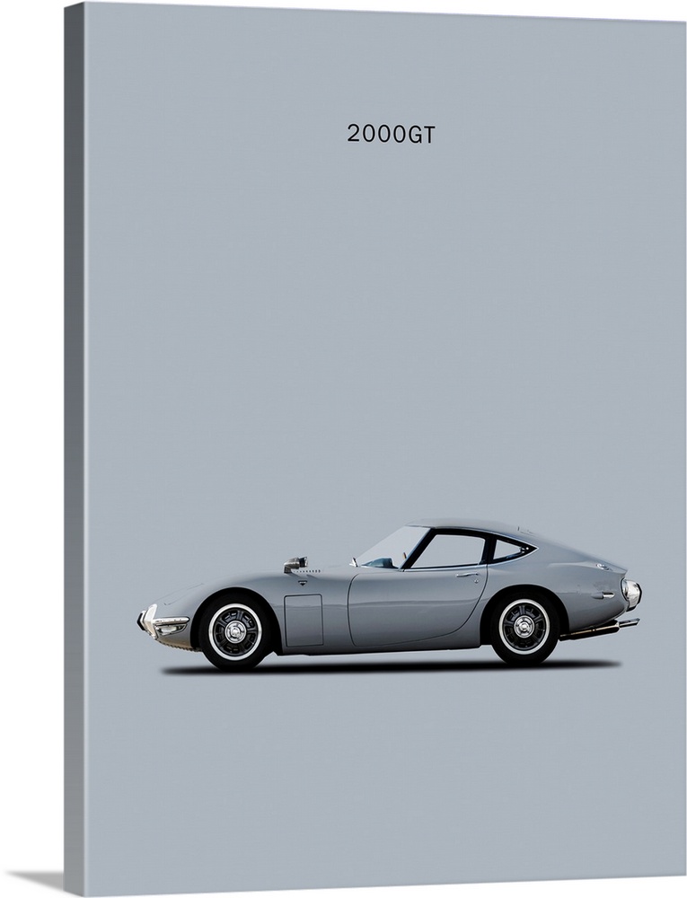 Photograph of a silver Toyota 2000GT printed on a gray background