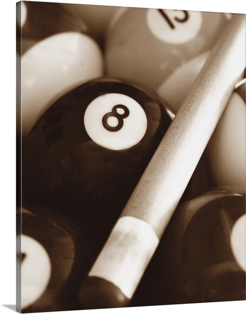 Sepia toned photo of a pool cue and pool balls.