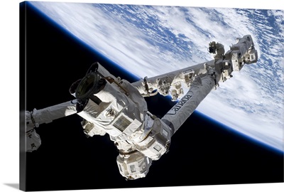 Canadarm2, readying to grab a Dragon spaceship soon