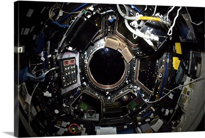 Inside the Cupola in the shadow of the Earth, our nighttime