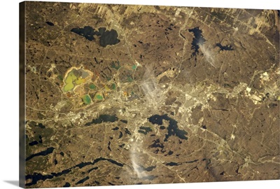 Sudbury, Ontario, rich in nickel and copper, the ore put there by an asteroid impact