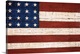image thumbnail of Gicloe print of an Americana folk art painting of an American Flag (stylized with eight stars and seven stripes) on wood.