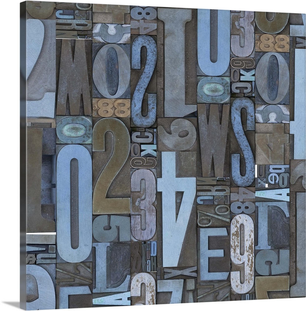 Abstract canvas print of random numbers and letters arranged together in varying directions and sizes.