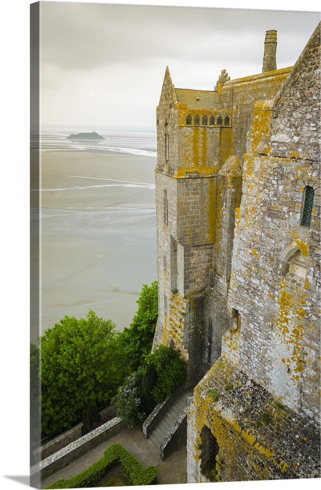 Abbey walls and bay, Mont Saint-Michel monastery, Normandy, France.