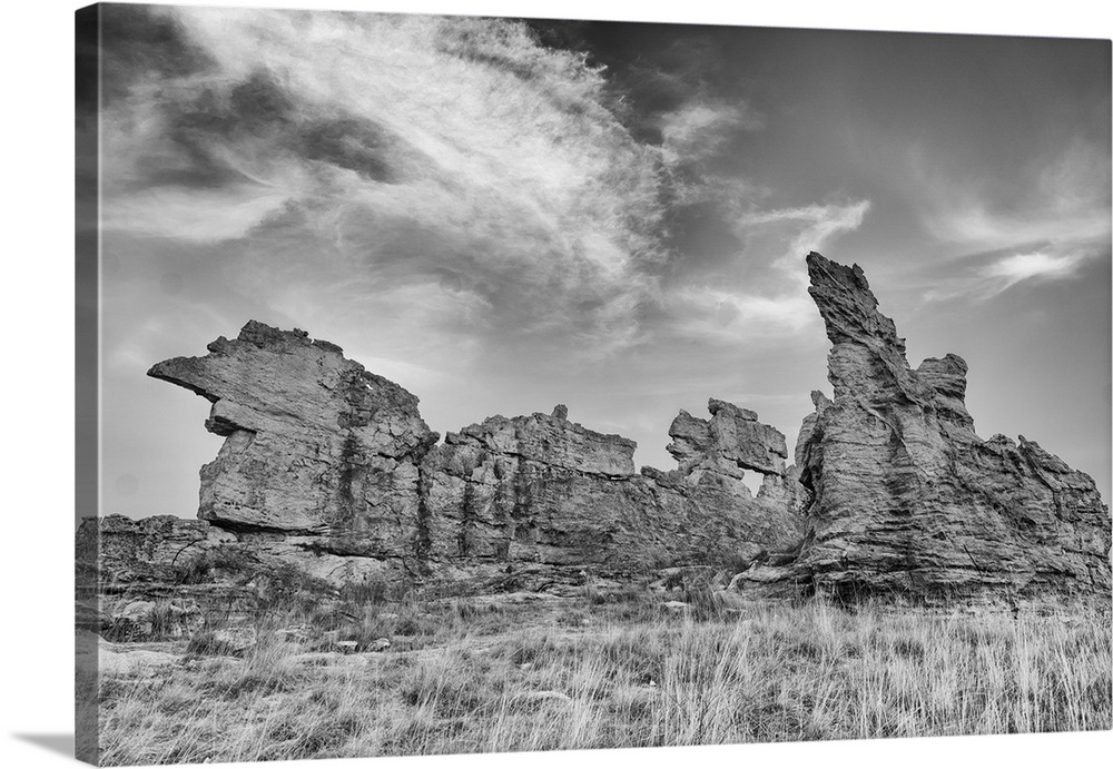 Africa, Madagascar, Isalo National Park. The clouds set off the sandstone formation in this black and white rendition.