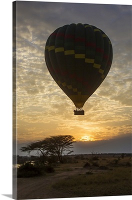 Africa. Tanzania. Hot air balloon crossing the Mara river in Serengeti NP.