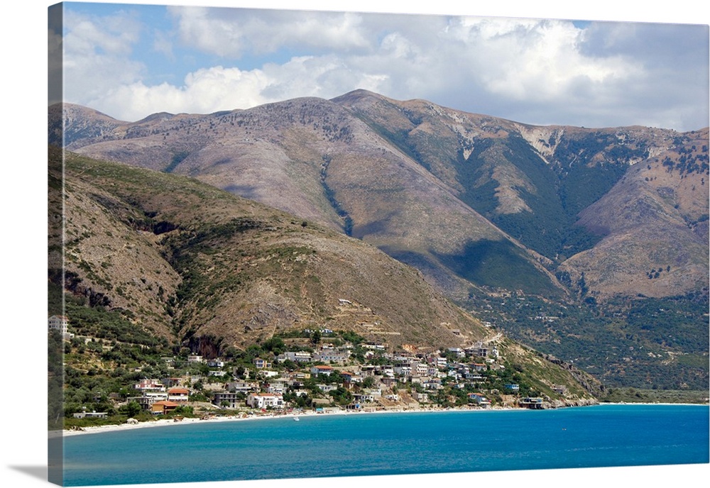 REPUBLIC OF ALBANIA. Qeparo beach with mountainous landscape in the background.