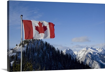 Alberta, Banff, Mountain views with Canadian flag on the summit of Sulphur Mountain