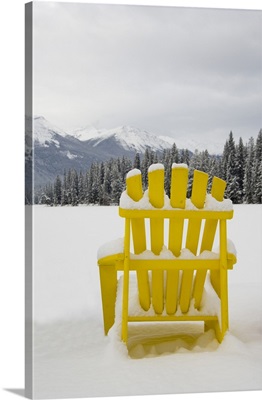 Alberta, Jasper National Park, Colorful chairs around frozen lake, Lac Beauvert