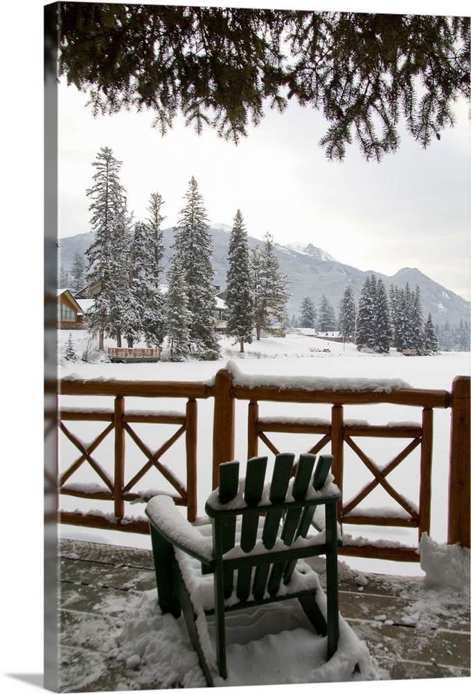 Canada, Alberta, Jasper, Jasper NP. Fairmont Jasper Park Lodge, lodge deck looking out over frozen Lac Beauvert.