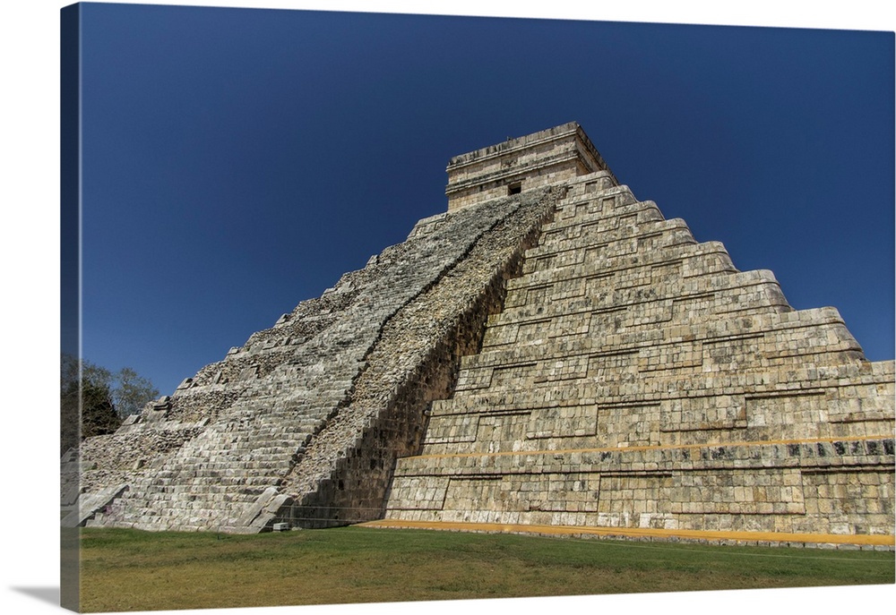 Ancient step pyramid Kukulkan at Chichen Itza Mexico.