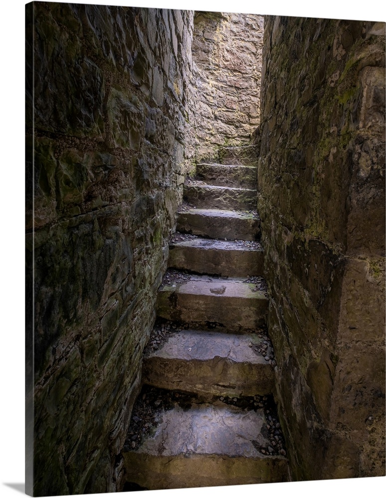Ancient steps lead to a roofless second floor room.
