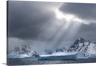 Antarctica, South Georgia Island, Sunbeams Light Up Icebergs