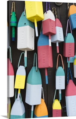 Bar Harbor, Maine, colorful buoys on wall for sale