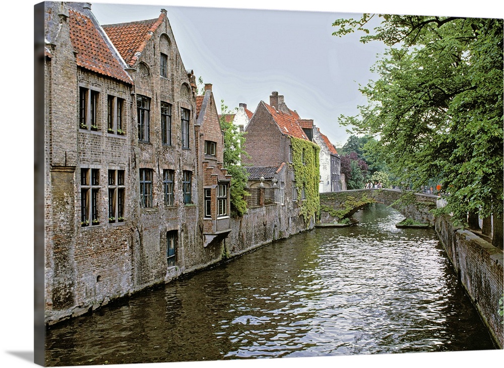 Europe, Belgium, Brugge. Old stone homes line the canals in Brugge, a World Heritage Site, Belgium.