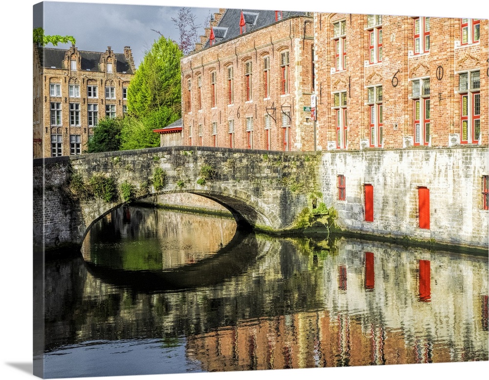 Belgium, Brugge. Reflections of medieval buildings along canal.