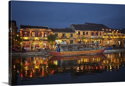 Boat And Restaurants Reflected In Thu Bon River At Dusk In Vietnam