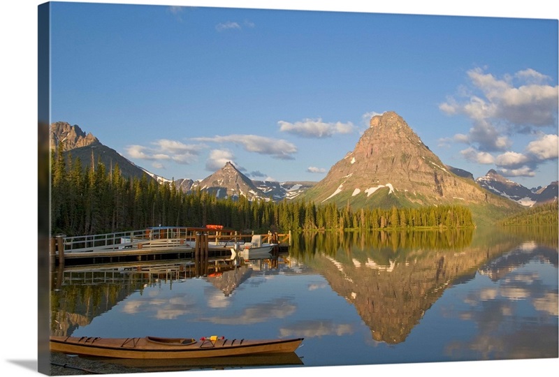 Boats and kayak along Two Medicine Lake in Glacier National Park in ...