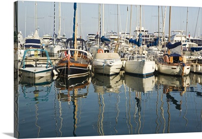 Boats and reflections in the marina area of Beaulieu sur Me, South of France